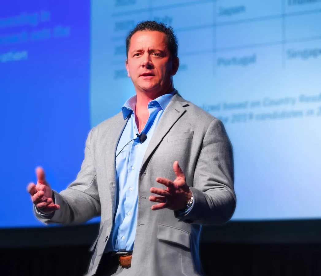 Darin Cross, founder of Gravion Prep, speaking on stage